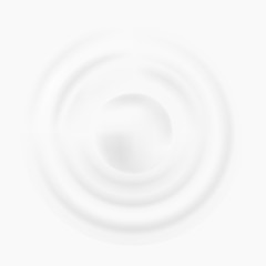 Milk or cream splash top view with an isolated 