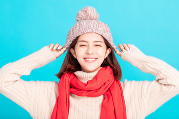 happy young asian woman wearing stylish warm clothes