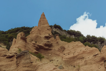 Fototapeta na wymiar Italy, August 2020 - Panoramic view of the Canyon of the Lame Rosse near Lake Fiastra in the Marche Region
