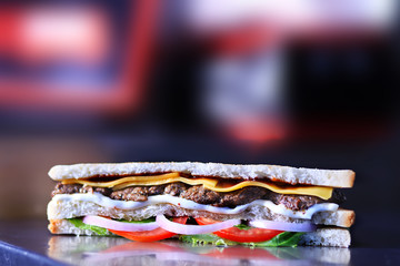 Fresh and juicy Sandwich, cheese, tomatoes, lettuce, and toasted bread yummy food 