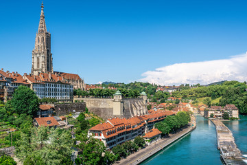 Scenic Bern old town cityscape with old buildings Bern Minster cathedral and Aare river view in Bern Switzerland - obrazy, fototapety, plakaty