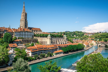 Scenic Bern old town cityscape with old buildings Bern Minster cathedral and Aare river view in Bern Switzerland
