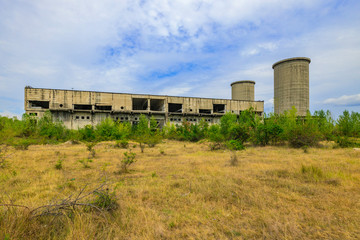 Fototapeta na wymiar Building of an industrial complex in degradation