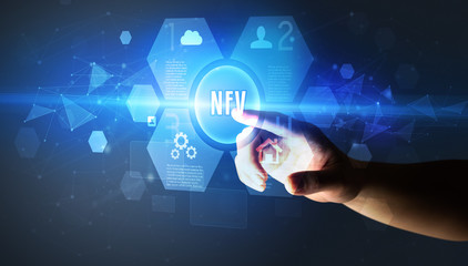 Hand touching NFV inscription, new technology concept