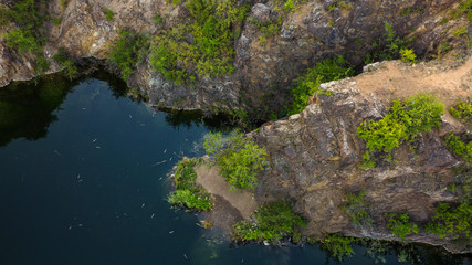 Shore of a clean lake with clear water, bird's eye view