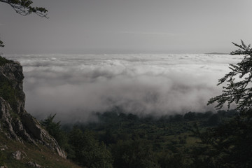 Aerial view of mountain covered with clouds