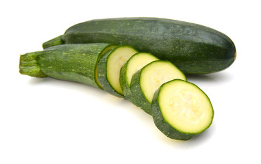 green zucchini vegetables isolated on white