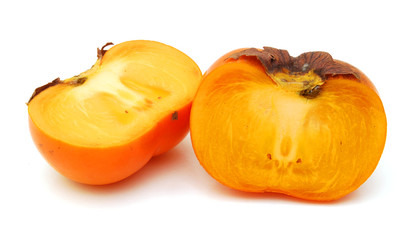 Ripe persimmon with cut isolated on white background