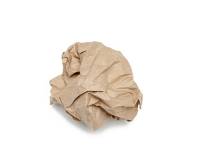 crumpled ball of brown sheet of parchment paper isolated on white background