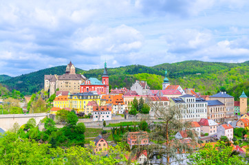 Aerial panoramic view of medieval Loket town with Loket Castle Hrad Loket gothic style on massive rock, colorful buildings, bridge over Eger river, Karlovy Vary Region, West Bohemia, Czech Republic