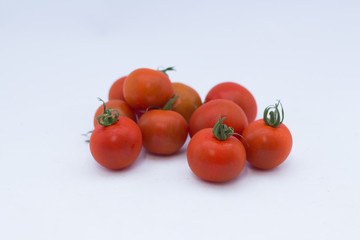 Red tomatoes .
