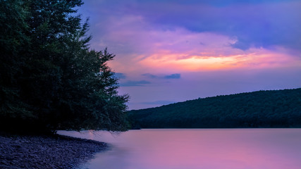 Long Exposure  Taken on a Summer Evening after sunset of Lake Wallenpaupack in the Pocono Mountains of Pennsylvania 