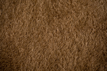 brown carpet background, fabric texture
