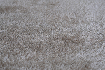 gray carpet background, gray fabric texture background, closeup
