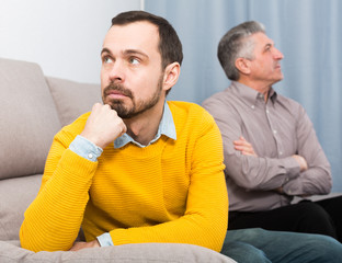 Mature father and son discuss family problems and solve relationship problems