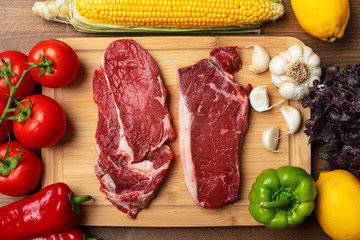 Food, meat and vegetables background. steak, fresh raw beef, background.
