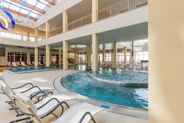 Indoor swimming pool in hotel spa and wellness center