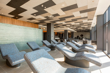 Hot stone mosaic sunbeds in wellness center