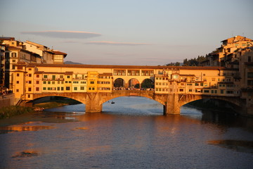 Obraz premium View of Ponte Vecchio bridge during sunset in Florence, Tuscany, Italy