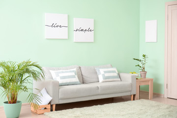 Interior of room with stylish mint wall