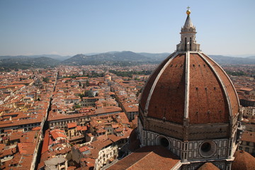 Fototapeta na wymiar Aerial View of Florence city with top of Florence Duomo in Florence, Italy