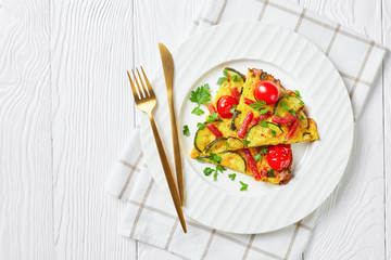 frittata, omelet on a plate, top view