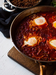 Tomato based Shakshuka - Middle Eastern food in the pan.