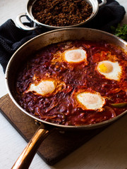 Tomato based Shakshuka - Middle Eastern food in the pan.