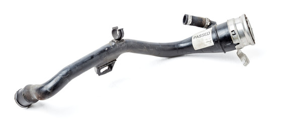 Fuel tank filler neck made of black rubber hose on a white isolated background in a photo studio for sale on auto-parsing or for replacement when repairing a car timing system.