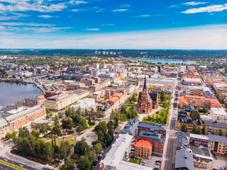 Fototapeta na wymiar Lulea, Sweden - July 05, 2019: Panorama city, Cathedral sunny day, blue sky