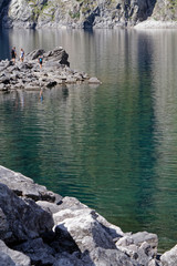 Rocks reflections on Lauvitel lake