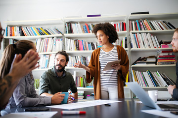 Creative managers crew working with new startup project in office. Team brainstorming.