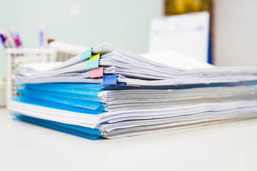 file folder and Stack of business report paper file on the table