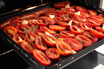 Sun dried tomatoes with olive oil and herbs