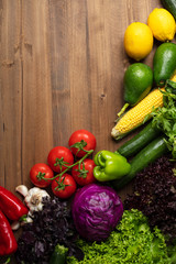 Fresh organic vegetables on wooden background. healthy eating concept. food background.