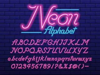 Glowing neon light alphabet design with uppercase, lowercase, numbers and symbols