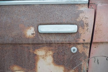close up old dirty door car