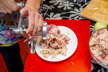 meat rolled into minced meat through a manual meat grinder