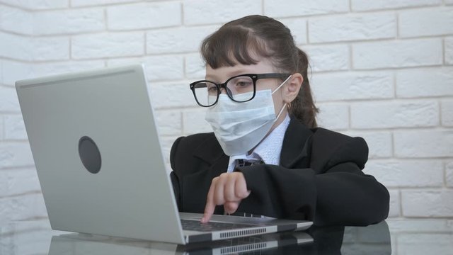 Quarantined child computer work.