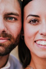 close up view of young happy couple together. Eyes close up. Love and family concept - 372718079