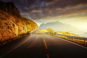 road by the sea in sunrise time, Lofoten island, Norway