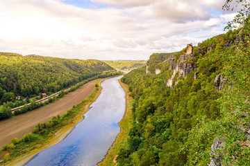 Obraz premium View from the bastei viewpoint of the Elbe river - beautiful landscape scenery of Sandstone mountains in Saxon Switzerland National Park, Germany