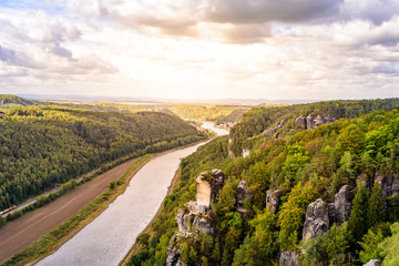 View from the bastei viewpoint of the Elbe river - beautiful landscape scenery of Sandstone mountains in Saxon Switzerland National Park, Germany