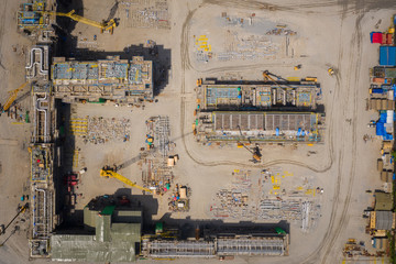 Fototapeta na wymiar Aerial top view construction site building for new factory area