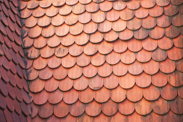 Close up of an old roof rounded ceramic tile background with corner