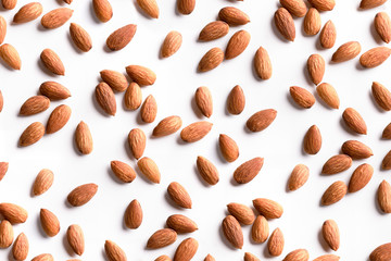 Roasted peeled almond nuts texture ,top view. Almond nuts background. Best healthy food almond concept