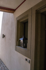 old lantern stands on the window