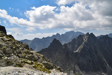 The beautiful walls of the Javorowy Peak (Javorovy stit). High northern walls of the peaks (Javorovy stit - Jaworowy Szczyt, Maly Javorovy stit - Maly Jaworowy Szczyt, Ostry Szczyt). Area of climbing.