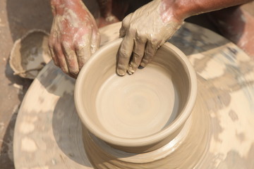 Fototapeta na wymiar clay potter, clay molding, man plotter