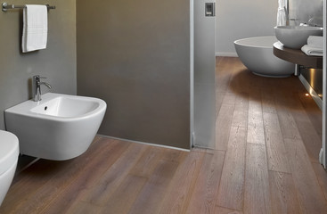 modern bathroom interior with wooden floor